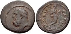 LYDIA, Sardis. Pseudo-autonomous issue. 2nd-3rd centuries AD. Æ 22mm (6.18 g, 6h). Bearded head of Herakles left / Omphale standing right, lion's skin draped over shoulders, holding club over left sho