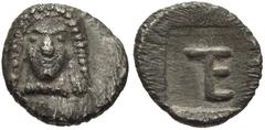 IONIA, Kolophon. Circa 450-410 BC. AR Tetartemorion (6mm, 0.23 g, 3h). Facing head of Apollo / TE (tetartemorion) monogram in incuse square. Milne, Colophon 7; SNG Kayhan 356; SNG von Aulock 1999; Ros