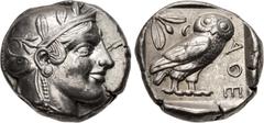Greek ATTICA, Athens. Circa 454-404 BC. AR Tetradrachm (24mm, 17.11 g, 5h). Helmeted head of Athena right, with frontal eye / Owl standing right, head facing, closed tail feathers; olive spray and cre