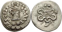 LYDIA, Tralleis. Circa 166-67 BC. AR Tetradrachm (29mm, 12.63 g, 12h). Cistophoric type. Struck 140-135 BC. Cista mystica with serpent; all within ivy wreath / Bow-case with serpents; to right, head o