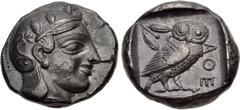 Greek ATTICA, Athens. Circa 454-404 BC. AR Tetradrachm (24mm, 17.15 g, 12h). Helmeted head of Athena right, with frontal eye / Owl standing right, head facing, closed tail feathers; olive sprig and cr