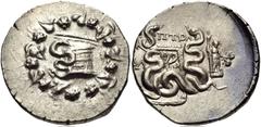 LYDIA, Tralleis. Circa 166-67 BC. AR Tetradrachm (26mm, 12.66 g, 1h). Cistophoric type. Ptol-, magistrate. Dated CY 3 (131 BC). Cista mystica with serpent; all within ivy wreath / Two serpents entwine