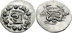 LYDIA, Tralleis. Circa 166-67 BC. AR Tetradrachm (12.30 g, 1h). Dated CY 4 (130 BC). Cista mystica with serpent; all within ivy wreath / Two serpents entwined around bow and bowcase; ΠTOΛ above, Δ (da