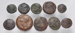 Large Lots GREEK. Magna Graecia & Sicily. Lot of twenty (20) Syracusan bronze coins. Includes: An interesting selection, all from the same collection, with hand-written cabinet tickets. Average Fair t