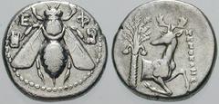 Estimate $500 IONIA, Ephesos. Circa 387-295 BC. AR Drachm (3.53 gm). E-F, bee with straight wings; astragali on either side / Forepart of a stag right, palm tree left; magistrate XENOKLHS. Head - (see