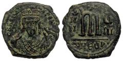Byzantine Mauricius Tiberius AE Follis, Theoupolis/Antioch mint AE Follis ( Byzantine. 10.34 g. 26 mm) Bust facing, wearing crown with trefoil ornament, and consular robe; in right hand, mappa; in lef