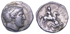 MONETE GRECHE REGNO DI PEONIA. PATRAOS, 340-315 a.C., Tetradracma. Testa di Apollo a d. R/ Guerriero a cavallo atterra nemico. BMC 3 v. Rara. g. 12,87. Diam. mm. 22,49. Arg. BB Shipping only in Italy.