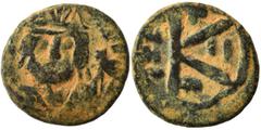 Byzantine Byzantine follis, contemporary imitation 6-7th centuries. Half follis (bronze, 5.40 g, 20 mm). Crowned facing bust, holding globus cruciger. Rev. Large K; A/N/N/O to left, II to right; cross