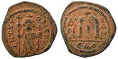 Islamic Time of the Rashidun. Pseudo-Byzantine types, before AH 24 / 645 AD. Fals (bronze, 4.24 g, 24 mm), imitating follis of Constans II. ЄN T૪TO NCPVO Imperial figure standing facing, wearing crown