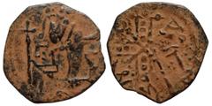 Byzantine Uncertain Byzantine Follis, overstruck with Islamic fals (bronze, 1.67 g, 20 mm). Christ facing, holding long cross. Rev. Jeweled cross. Overstruck with unknown Islamic legend. Fine.