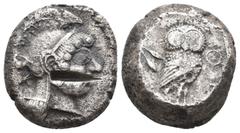 Greek ATTICA. Athens, AR, Tetradrachm. 515 BCE - 482 BCE Obv: Athena head of right; archaic style. Test cut over face. Rev: ΑΘΕ. Owl standing, right; head facing, behind olive sprig. The first era of 