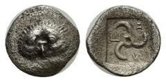 GREEK DYNASTS of LYCIA. Mithrapata. Circa 390-370 BC. AR Twenty-fourth Stater (9mm, 0.38 g). Uncertain mint. Facing lion scalp / Triskeles within incuse square.