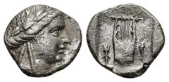 GREEK LYCIA, Pseudo-Lycian League, Phaselis. after 168 BC. AR Drachm (2.2 Gr. 13mm.). Laureate head of Apollo Rev. Lyre in shallow incuse square, thunderbolt and torch on either side.