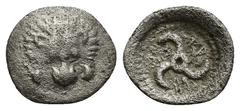 GREEK Dynasts of Lycia. c. 390-360 BC (0.61 Gr. 11mm.) Facing lion's scalp Rev. Triskeles, incuse square