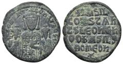 BYZANTINE Basil I, with Leo VI and Constantine VII AD 867-886. Constantinople Follis Æ (25mm, 9,2 g) + LEOn bASIL S COnST AU, half-length crowned facing busts of Basil (center), wearing loros, and Leo