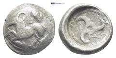 GREEK Dynasts of Lycia. Uncertain mint. Kuprilli or Kubernis circa 450-410 BC. AR (11mm., 1.49 g). Goat kneeling left; facing head of panther above / Triskeles, within pelleted circular border, within