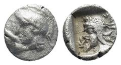 GREEK Dynasts of Lycia, Kherei AR Obol. (9mm, 0,56 g) Circa 410-390 BC. Helmeted head of Athena left / Laureate head of bearded dynast left, wearing Persian tiara, monogram before, legend behind; all 
