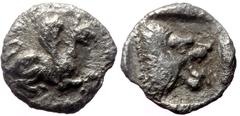 Greek Troas, Assos, AR Hemiobol, (Silver, 0.21 g 6 mm),Circa 500-450 BC. Troas, Assos, AR Hemiobol, (Silver, 0.21 g 6 mm),Circa 500-450 BC. Obv: Griffin seated to right, raising forepaw Rev: Head of r