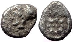 Greek Ionia, Uncertain, AR Hemiobol, (Silver, 0.47 g 8 mm). 5th century BC. Ionia, Uncertain, AR Hemiobol, (Silver, 0.47 g 8 mm). 5th century BC. Obv: Head of Athena (?) to left, wearing Corinthian he
