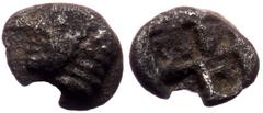 Greek Ionia, Phokaia AR Tetartemorion (Silver, 0,12g, 4mm) late 6th Century BC Ionia, Phokaia AR Tetartemorion (Silver, 0,12g, 4mm) late 6th Century BC Obv: Archaic female head left. Rev: Incuse squar