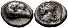 Greek Caria, Uncertain. AR Hemiobol, (Silver 0.51 g 7 mm). 5th-4th centuries BC. Caria, Uncertain. AR Hemiobol, (Silver 0.51 g 7 mm). 5th-4th centuries BC. Obv: Head of ram to right. Rev: Young male h