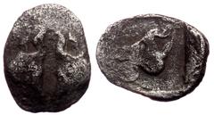 Greek Caria, Uncertain AR Tetartemorion (ca 5th century BC). Caria, Uncertain AR Tetartemorion (ca 5th century BC). Obv: Confronted heads of two bulls Rev: Forepart of bull left within incuse square. 