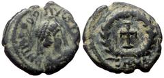 Roman Imperial Theodosius II, AE, Nummus. (Bronze, 1.12 g. 13 mm.) Cyzicus 402-450 AD. Theodosius II, AE, Nummus. (Bronze, 1.12 g. 13 mm.) Cyzicus 402-450 AD. Obv: D N THEODOSIVS [P F AVG], Bust of Th