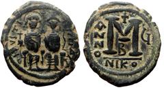 Byzantine Justin II and Sophia, AE, Follis. (Bronze, 13.75 g. 31 mm.) Nicomedia. 565-578 AD. Justin II and Sophia, AE, Follis. (Bronze, 13.75 g. 31 mm.) Nicomedia. 565-578 AD. Obv: DN IVSTI[NVS PP] AV