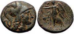 Greek coins Pamphylia, Side AE (Bronze, 3.89g, 16mm) 2nd-1st Century BC Obv: Helmeted head of Athena right Rev: ΣI-ΔHTΩN, Nike advancing left, holding wreath and palm; pomegranate before. Ref: SNG Cop