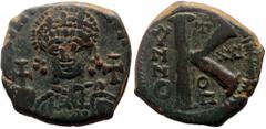Byzantine coins Justinian I (527-565) AE half follis (Bronze, 26mm, 9.58g) Antioch Obv: D N IVSTINIANVS P P AVG, helmeted and cuirassed bust of Justinian I facing, holding globus cruciger and shield, 