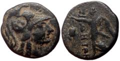 Greek coins Pamphilia, Side AE (Bronze, 3.35g, 17mm) 2nd-1st Century BC. Obv: Helmeted head of Athena right Rev: ΣI-ΔHTΩN, Nike advancing left, holding wreath and palm; pomegranate before. Ref: SNG Co