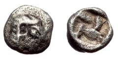 Greek Ionia, Kolophon AR Tetartemorion (Silver, 5mm, 0.13g) Late 6th century BC. Ionia, Kolophon AR Tetartemorion (Silver, 5mm, 0.13g) Late 6th century BC. Obv: Archaic head of Apollo right Rev: Quadr