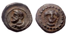 Greek Cilicia, uncertain mint AR Tetartemorion (Silver, 0.18g, 5mm) ca. 4th century BC Cilicia, uncertain mint AR Tetartemorion (Silver, 0.18g, 5mm) ca. 4th century BC Obv: Veiled and draped bust of f