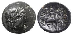 Greek Lydia, Tripolis as Apollonia, c. 1st century BC. Æ (18mm, 5.45g, 12h). Laureate head of Zeus r. R/ Horseman r., wearing chlamys, holding bipennis over shoulder, riding r. over maeander pattern. 