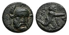 Greek Troas, Ophrynion. AE, 1.40 g 11.02 mm. 4th century BC. Obv: Helmeted head of Hektor facing slightly right. Rev: [OΦPY], Infant Dionysos kneeling right, holding grape bunch. Ref: SNG Arikantürk 7