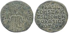 Byzantine Basil I, Leo VI and Constantine VII, 867-886 AD. AE, Follis. 6.60 g. 25.18 mm. Constantinople. Obv: LEON bASIL S CONST AVGG. Basil I, crowned, with short beard, wearing loros, holding akakia