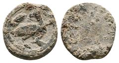 Seals & Weight & Token PB Asia Minor. Byzantine Nomisma Weight (AD 9th–10th centuries) Round in form; stamped on face with circular border enclosing bird to right; bird’s head turned back to left; pla