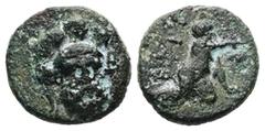 Greek Troas, Ophrynion. AE, 1.68 g 12.34 mm. 4th century BC. Obv: Helmeted head of Hektor facing slightly right. Rev: [OΦPY], Infant Dionysos kneeling right, holding grape bunch. Ref: SNG Arikantürk 7