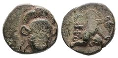 Greek Troas, Ophrynion. AE, 1.55 g 12.49 mm. 4th century BC. Obv: Helmeted head of Hektor facing slightly right. Rev: OΦPY, Infant Dionysos kneeling right, holding grape bunch. Ref: SNG Arikantürk 713