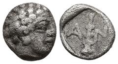 Greek LESBOS. Antissa. (Circa 400 BC) AR Tetartemorion (6mm 0,21g). Obv: Youthful male head (apparently a sub-Saharan African). Rev: Club, shown vertically with the head below, dividing Α - Ν; all wit