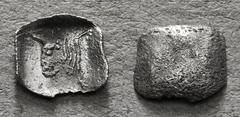 Greek Coins LYCIA or CARIA. Uncertain. Tetartemorion (Circa 5th century BC). Obv: Forepart of bull left within incuse square; Lycian (?) letters above. Rev: Plain 0,23 g