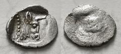 Greek Coins LYCIA or CARIA. Uncertain. Tetartemorion (Circa 5th century BC). Obv: Forepart of bull right within incuse square; Lycian (?) letters above. Rev: Plain 0,18 g - 9,05 mm