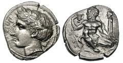 SICILY. Naxos. Ca. 420–403 BC. Silver didrachm (8.25 gm). Signed on the obverse by the artist Procles. ΝΑΞΙΟΝ, laureate head of Apollo left, laurel leaf and berry behind neck, die engraver’s initial Π