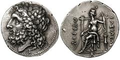 KINGDOM OF EPIRUS. Pyrrhus (297–272 BC). Silver tetradrachm (16.56 gm). Head of Zeus of Dodona left, wreathed with oak, Θ and ΣΕ monogram under neck truncation / ΒΑΣΙΛΕΩΣ ΠΥΡΡΟΥ, Dione seated left on 
