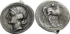 MONNAIES GRECQUES: SICILE ET CARTHAGE Drachme, Atelier italien, (vers 215-205). A/. Tête de Tanit à gauche, couronnée d'épis et de roseaux. R/. Cheval à droite sous un disque solaire. Cercle au-dessou