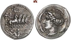 DIE SAMMLUNG ROGER WOLF - CLASSICA ET PATRIA. GRIECHISCHE MÜNZEN. SICILIA. SYRAKUS AR-Tetradrachme, 413/399 v. Chr., signiert von Euth(...) und Phrygillos; 16,91 g. Quadriga r., Nike bekränzt den gefl