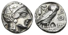 GRIECHISCHE MÜNZEN ATTICA, ATHEN. AR-Tetradrachme, um 420/405 v. Chr.; 17,25 g. Athenakopf r. mit attischem Helm//In Incusum: Eule r., dahinter Olivenzweig und Mondsichel, r. rautenförmiger Gegenstemp