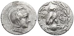 GREEK COINS GREEK COINS ATTICA ATHEN. AR-Tetradrachme, 141/140 v. Chr.; 15,43 g. Athenakopf r. mit attischem Helm//In Kranz: Eule auf Amphore v. v., r. Adler. Thompson vergl. 228 ff. Leicht korrodiert