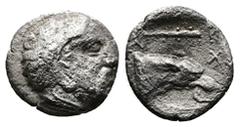 Greek Kings of Macedon. Archelaos, 413-400/399 BC. AR Triobol (10 mm, 0.73 g.). Aigai mint. Bearded head of Herakles to right, wearing lion's skin headdress. Rev. [AP] Χ Forepart of wolf right, gnawin