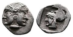 Greek Mysia, Lampsakos, circa. 500-450 BC. AR Hemiobol (10 mm, 0,56 g.). Female janiform head, wearing double stephane and a single rosette earring. Rev. Helmeted head of Athena left within incuse squ